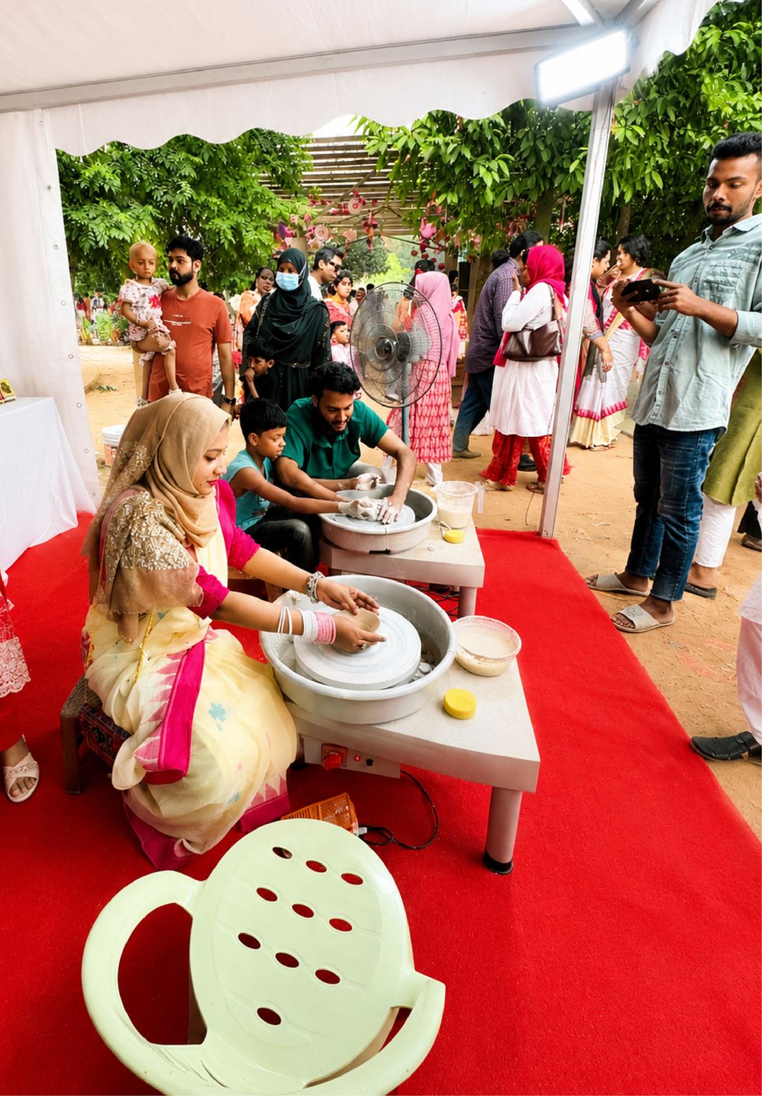 A child painting at the Boishakh Festival workshop